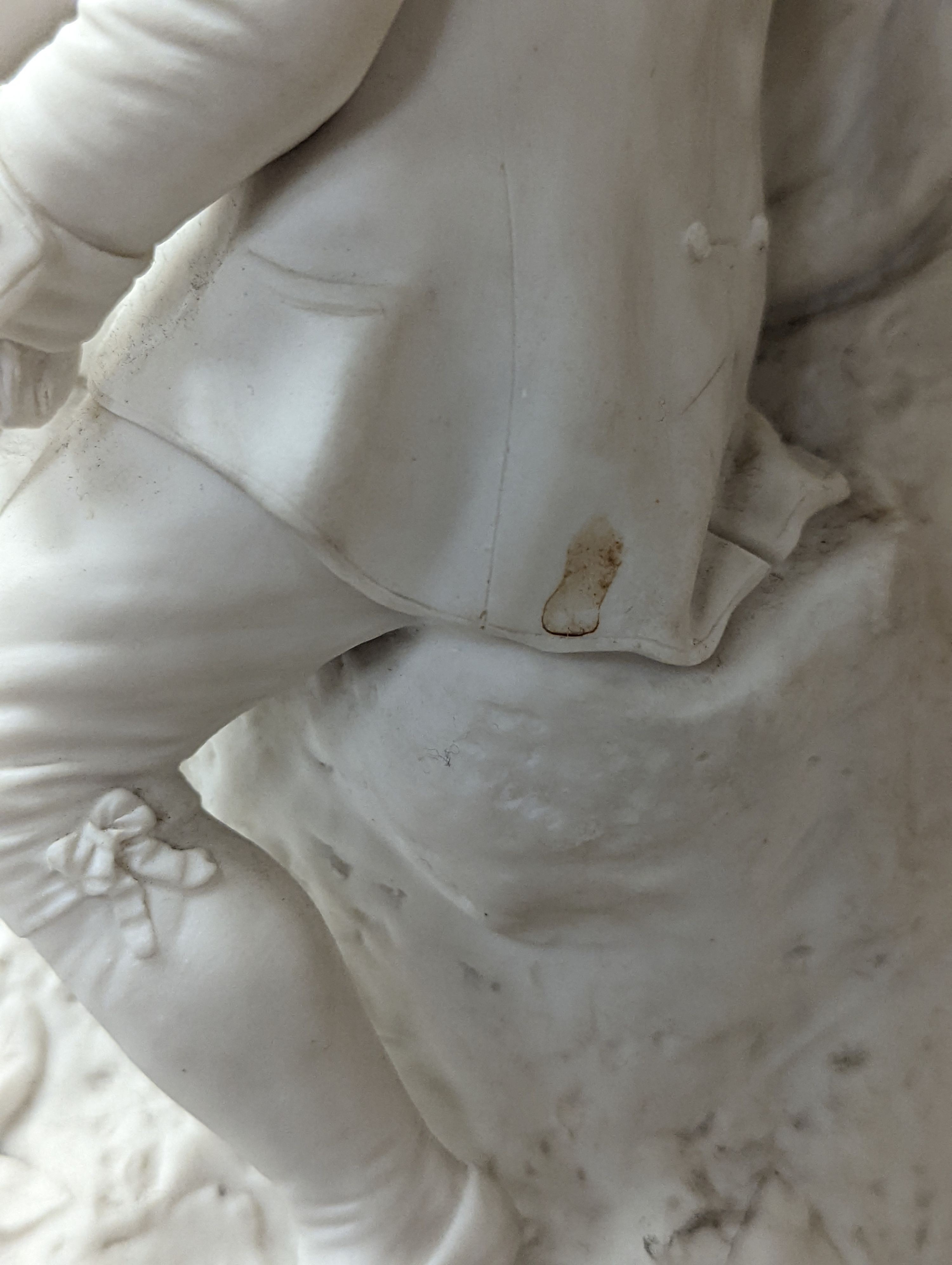 A 19th century Adams & Co. parian group of a man, woman, child and dog 31cm